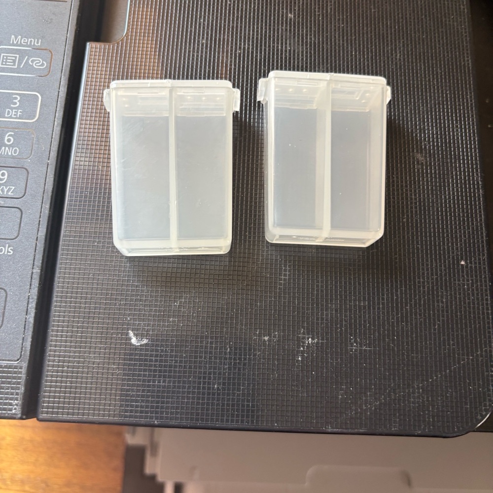 Tupperware mini clear salt and pepper shakers